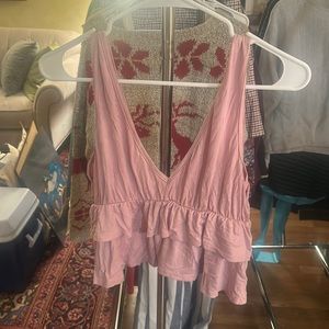 Pink v neck tank top with ruffles